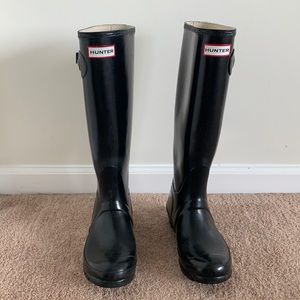 Tall shiny rain boots